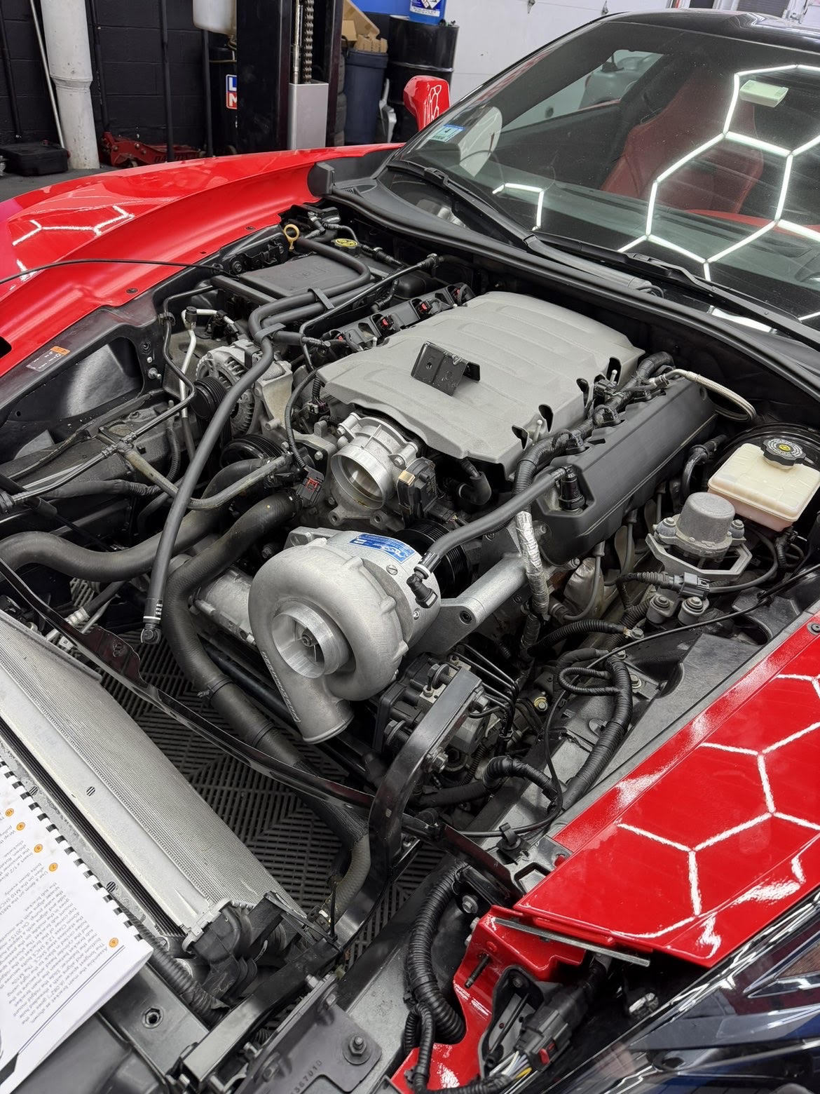 A red Corvette with a turbo kit